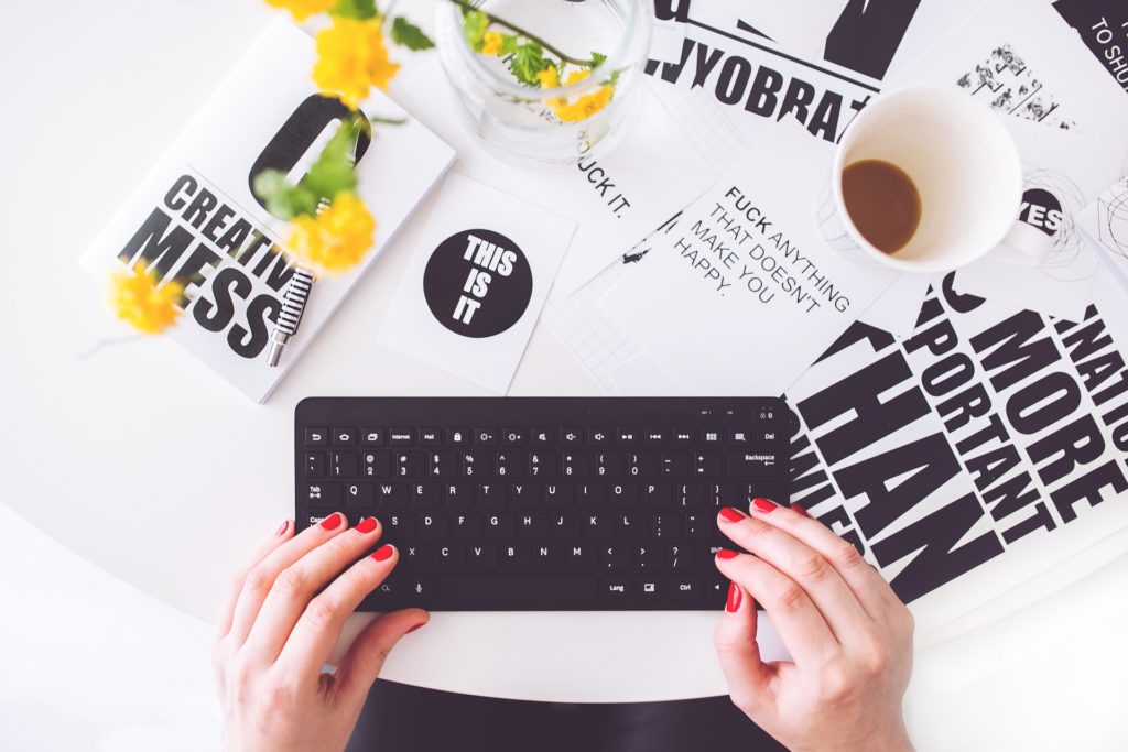 girl typing a letter